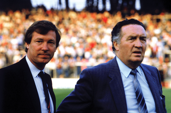 Skottlands manager Jock Stein (høyre) og hans assistent Alex Ferguson, like før Jock Steins død (1985).